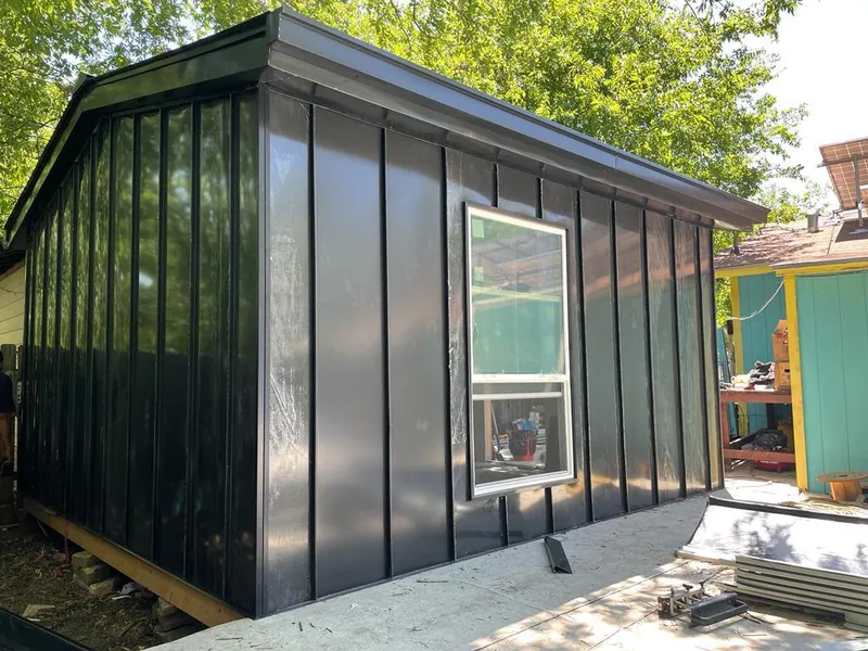 Black standing seam metal wall panels for Metal Roof Installation in Rocky Mount